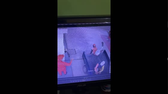 Person falls from truck tailgate after it opens in Trenggalek, Indonesia