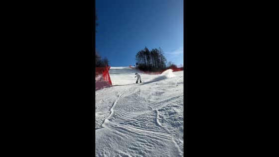 Snowboarder veers off course and falls in Xinjiang, China