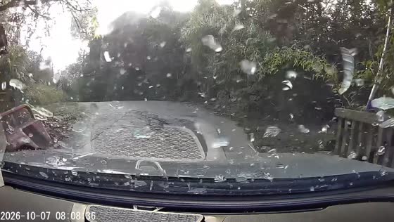 E-bike collides with a car’s windshield while swerving on a narrow rural road in Guang’an, China