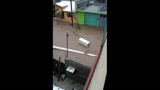 Refrigerator floats on water during floodin Emiliano Zapata, Mexico