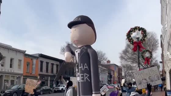 Tesla Takedown protest targets Elon Musk imagery in Washington, DC, USA