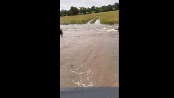 Farm flooded: impassable gate entry in Grovespring, Missouri