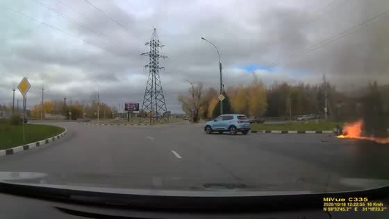 BMW motorcycle catches fire after collision with two cars in Veliky Novgorod, Russia