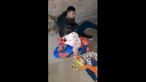 Phone mishap: collision with kids on scooter and bike toys