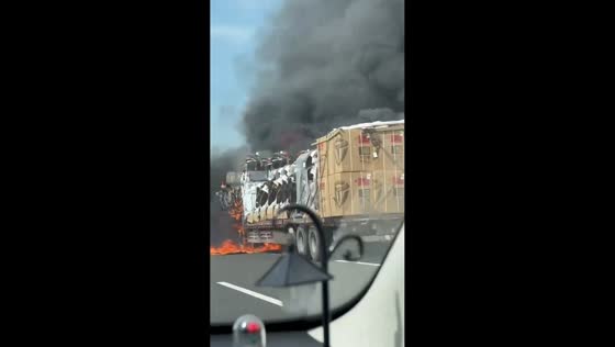 Driver narrowly avoids injury during truck explosion on highway in Henan, China