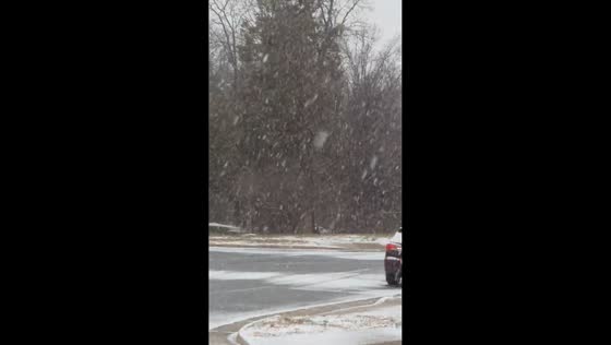 Steady heavy snow blankets the area in South Riding, Virginia, USA