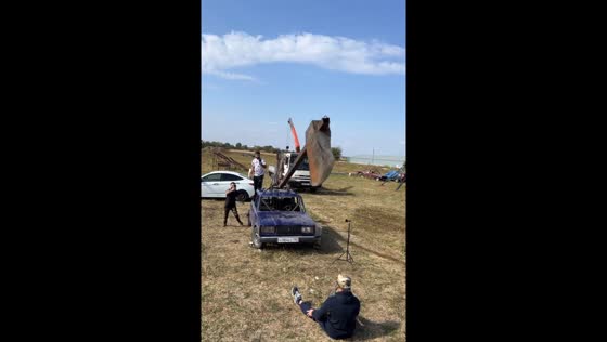 Man in Krasnodar, Russia performs stunt with axe dropping between his legs