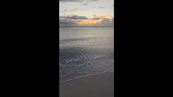 Serene sunset over the horizon in Anna Maria Island, Florida, USA