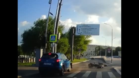 Biker hit by car while letting pedestrians pass in Moscow, Russia
