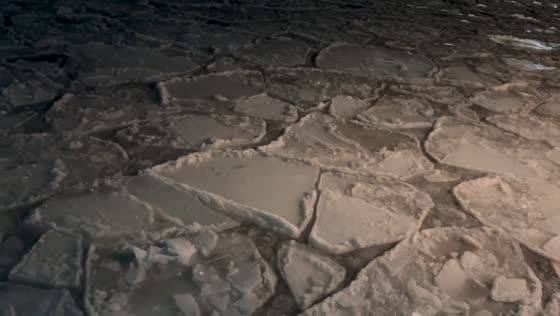 Ice floes drift along Hudson River in Manhattan, New York, USA