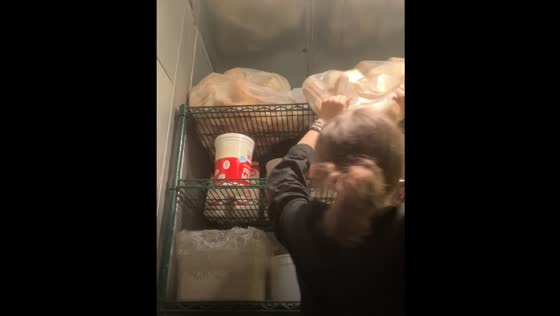 Person falls while reaching for a bag of bread in Chatham, United Kingdom