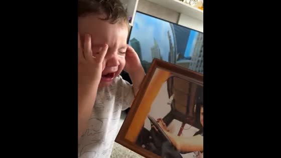 Child cries because dad went to work in Taganrog, Russia
