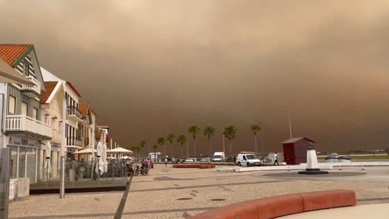 Smoke clouds over Costa Nova due to wildfires in Portugal