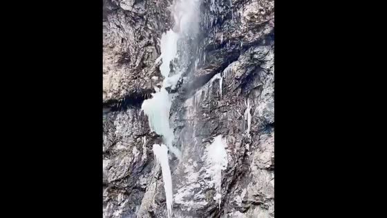 Frozen waterfall falls on people in Shaanxi province, China