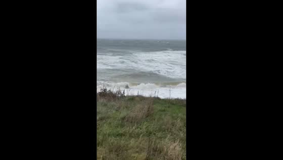 Strong winds and waves from Storm Benjamin in Happisburgh, Norfolk, UK