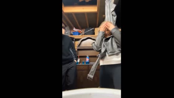 Mirror mishap: head bump caught on camera