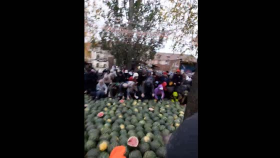 Crowd scramble for free watermelons during festival in Izhevsk, Russia