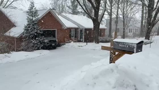Steady snowfall along North Main in Blacksburg, Virginia, USA