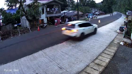 Child narrowly avoids SUV while crossing road in Libagon, Leyte, Philippines