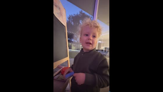 Clever chalkboard challenge: a father-son pictorial game of wits!