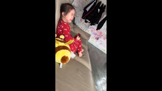 Little girl cries along with cartoon characters in Heilongjiang, China