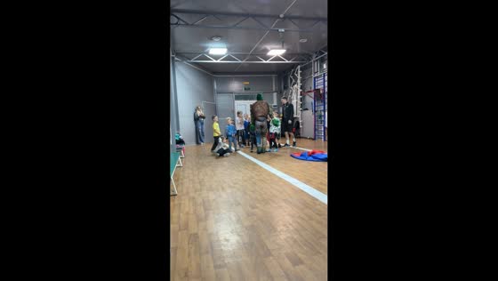 Boy copies Ninja Turtle performer at a party in Simferopol, Ukraine