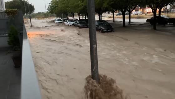 Severe urban flooding sweeps streets in Cuarte de Huerva, Spain