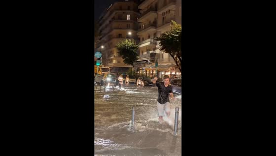 Man swept off his feet while crossing flooded street in Thessaloniki, Greece