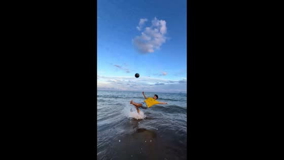 Beach football mishap sends ball into camera in Shandong, China