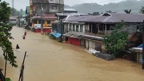 Flooding in Jipapad, Eastern Samar, Philippines, as heavy rains persist