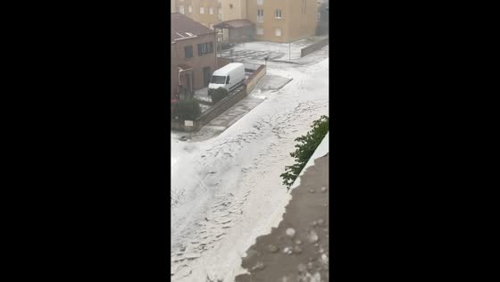 Violent hailstorm turns streets into icy rivers in Issoire, France