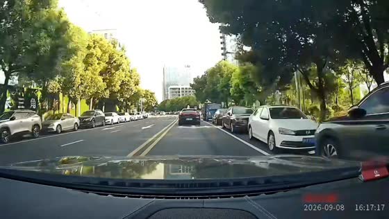 Black car hit by speeding vehicle at intersection in Jiangsu, China