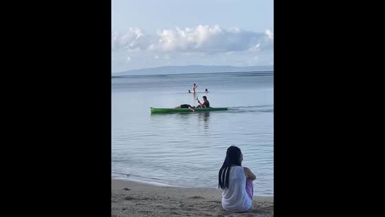 Woman falls from kayak and is assisted by lifeguard in Catanduanes, Philippines