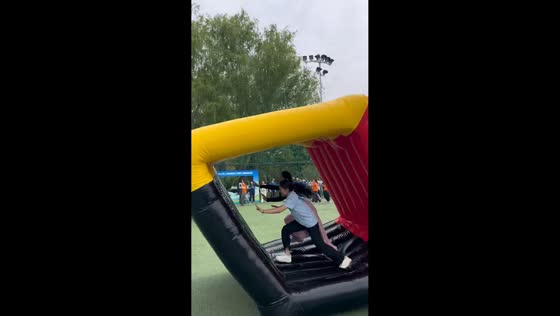 Two girls tumble during inflatable race mishap in Beijing, China