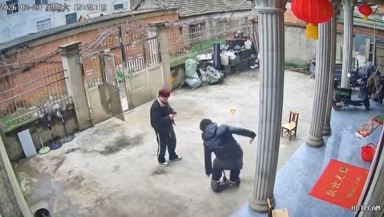 Man falls while trying hoverboard at entrance gate in Shanghai, China