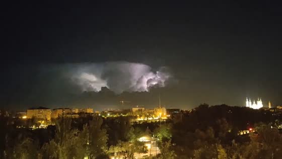 Dramatic lightning storm over the night sky in Zaragoza, Spain