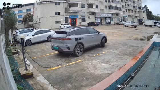 Electric car pulls down a charging station in Fujian, China