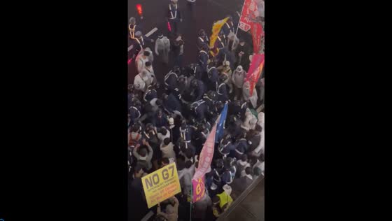 Japanese activists clash with police in Hiroshima during anti-war protest against the G7 summit