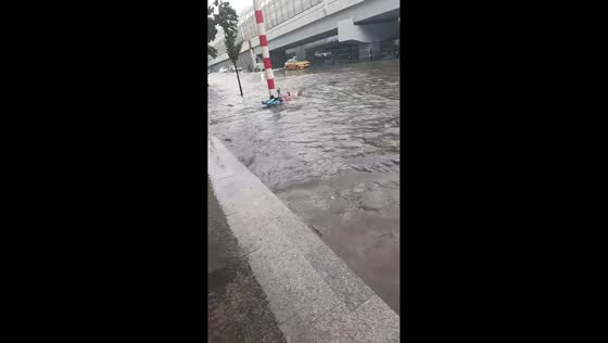 Torrential rain turns Harbin roads into raging rivers in Harbin, China