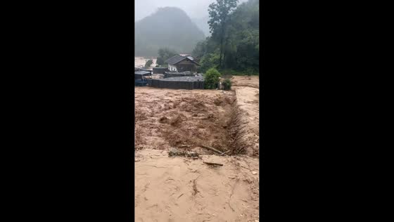 Flash floods sweep through after torrential rainstorms in Shaanxi, China