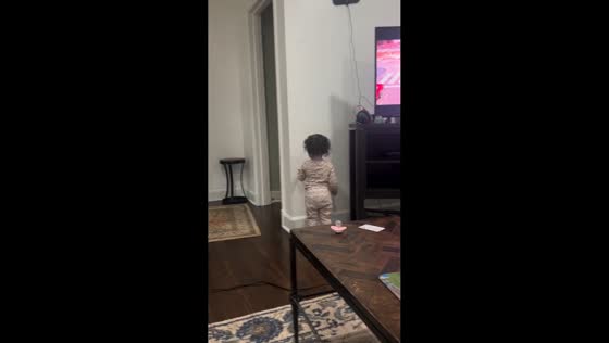 Toddler caught coloring on the wall in Memphis, Tennessee, USA