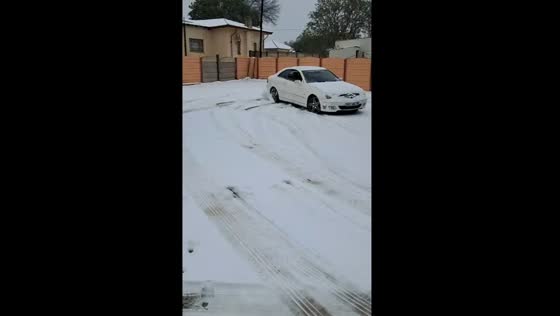 70-year-old enjoys driving in the snow in Volksrust, South Africa