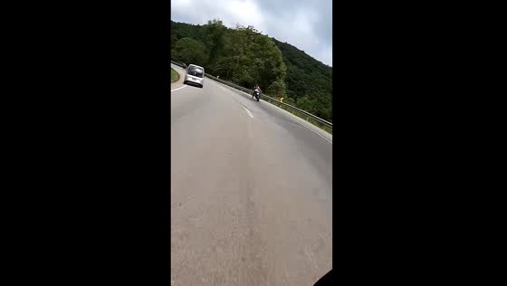 Close call: intense motorbike wobbles in Juatuba, Brazil caught on camera