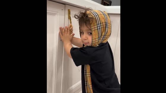 Twins playfully lock each other in cabinets in Ahvaz