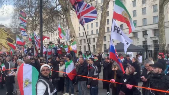 Crowd gathers on Whitehall in support of Iranian people in Westminster, London, UK