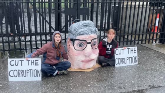 Protest blocks Carriage Gates at UK Parliament in London, UK