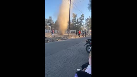 Dust devil crosses football field in Santiago del Estero, Argentina