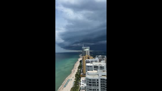 Shelf cloud advances over coastline in Sunny Isles Beach, USA