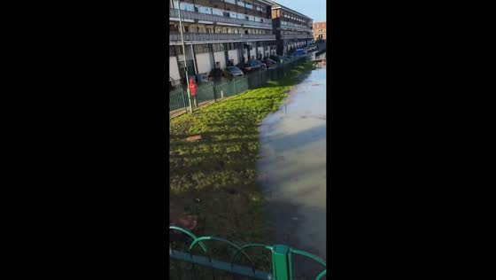 Flooded cars along Caledonian Road in London, UK