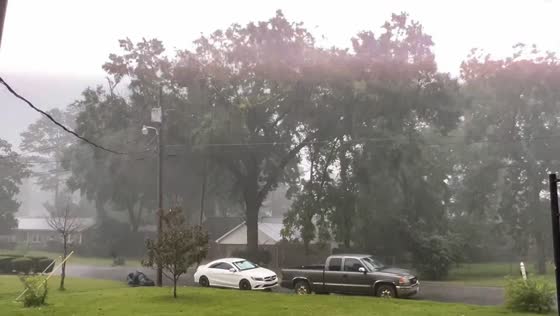 Heavy thunderstorm with lightning and rain along Watermelon Road in Alabama, USA